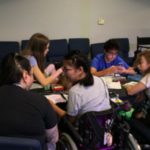 Students and instructors working together backstage at JDS Creative Academy